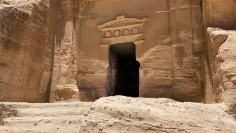 Small Petra of Jordan. The Monastery building behind twigs in the historic and Stock Footage 237809068