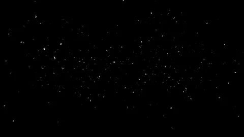Small Piece of Paper falling on black background Stock Footage 117894219