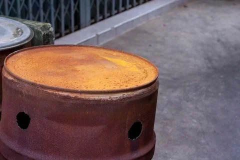 Small pieces of buns rusty 200 liters tank Stock Photos
