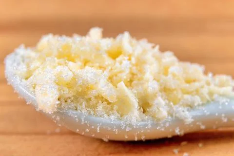 Small pieces of shredded coconut with white sugar. Foto stock