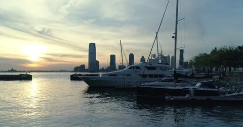 A small pier on Hudson river and cityscape on the sunset Stock Footage 82629479