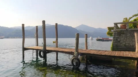 Small pier on Lake Orta Stock Footage 319449836