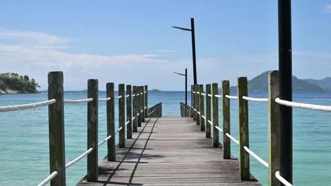 Small Pier Overlooking The Blue Ocean and Islands 動画素材 269345454