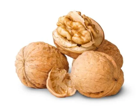 Small pile of walnuts and shells Stock Photos