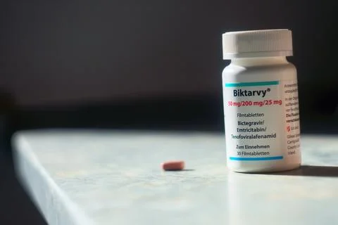 This is a small pill box with Biktarvy Stock Photos