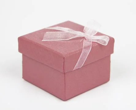 Small pink gift box Stock Photos