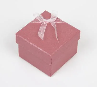 Small pink gift or ring box Stock Photos