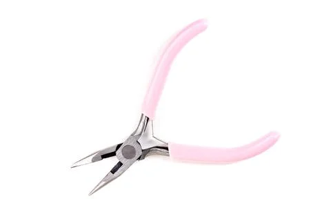 Small pink plastic handled beading pliers Stock Photos