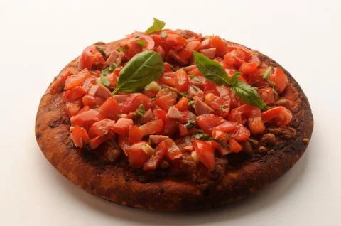 Small pizza on white background Stock Photos