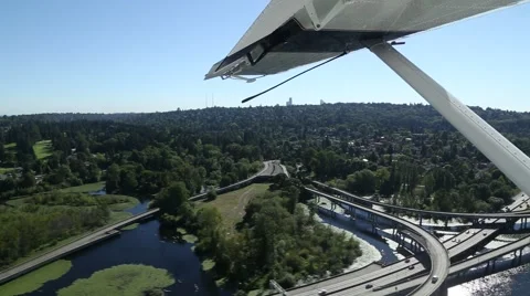 Small Plane above Freeway Video stock 42198453
