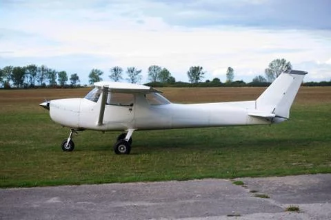 Small plane on aiport field Stock Photos