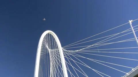 Small Plane Flying Over Suspension Cable Bridge Video stock 48787821