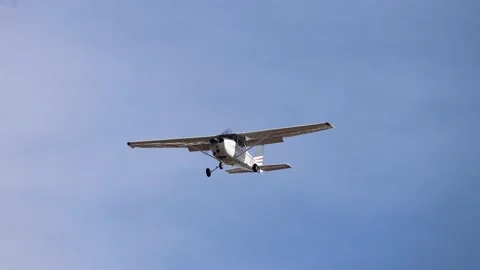 Small plane flys overhead Stock Footage 221378025
