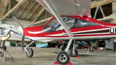 A small plane is in the hangar Stock Footage 197591797