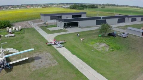  A small plane has landed in the field Stock Footage 147099703