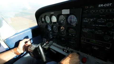A small plane is landing. The view from the cab. The pilot controls the plane Stock Footage 129085082