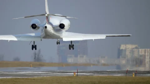 A small plane lands on the runway. Stock Footage 151258787