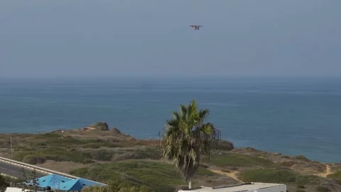 Small Plane Over Sea Stock Footage 156865685
