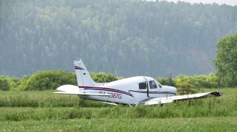A small plane is ready to take off to fly around forest fires Stock Photos