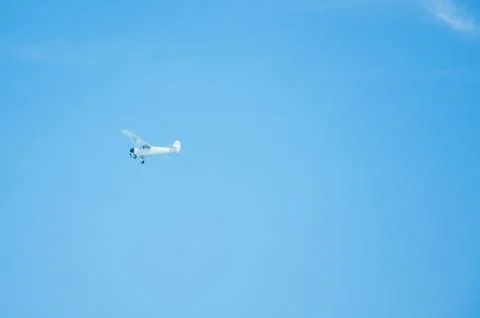 A small plane in the sky Stock Photos