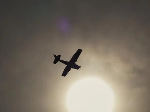 Small plane in the sky Stock Photos