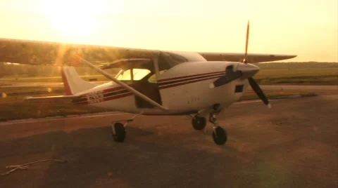 Small Plane at Sunrise Stock Footage