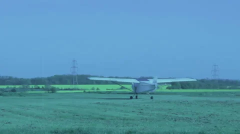 Small plane takes off old fashioned color scratched Video stock 42493706