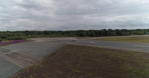 Small plane taking off from airport from drone with passengers drone aerial 4k Stock Footage 124647034