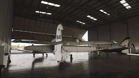 Small plane with two helices in a hangar 스톡 동영상 127425818