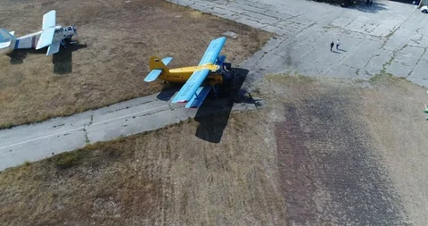 Small planes at the airport Stock Footage 124756724