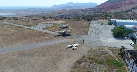 Small planes at the airport Stock Footage 124757009