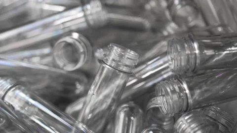 Small plastic blanks from underwater bottles travel along a conveyor belt Stock Footage 161988292