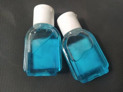 A small plastic bottle of the liquid hand wash and alcohol based sanitizer. Stock Photos