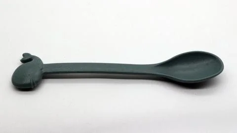 Small plastic spoon, specifically for babies Stock Photos