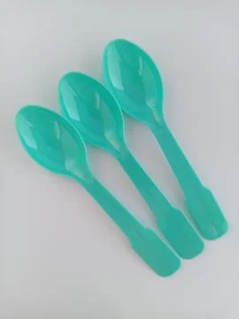 Small plastic spoons Stock Photos