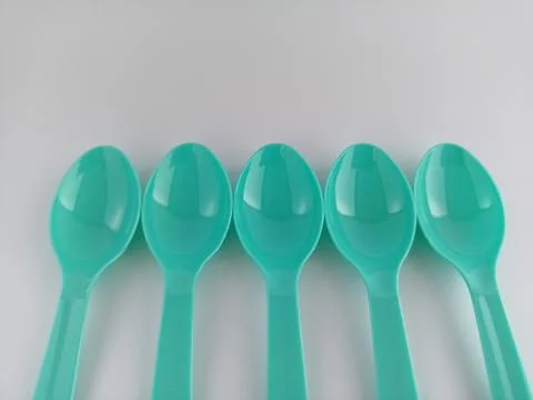 Small plastic spoons Stock Photos