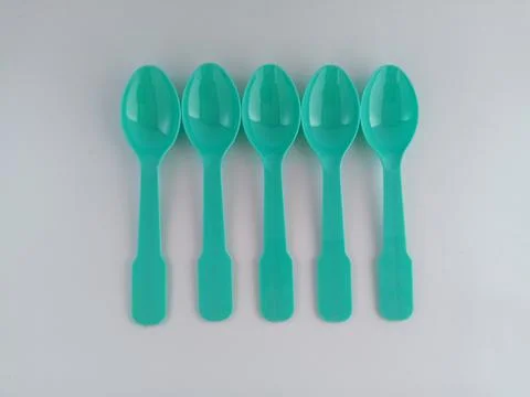 Small plastic spoons Stock Photos