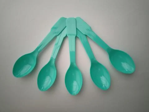 Small plastic spoons Stock Photos
