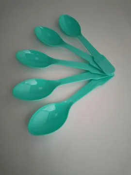 Small plastic spoons Stock Photos