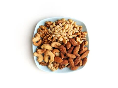 Small plate of assorted nuts Stock Photos
