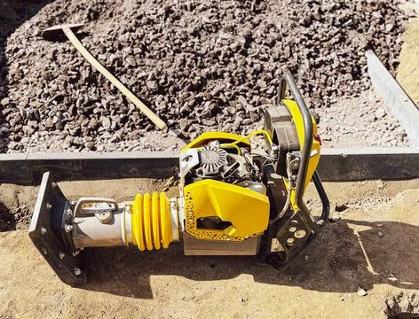 Small plate compactor, vibratory hammer, jumping jack machine, power tool at  Foto stock