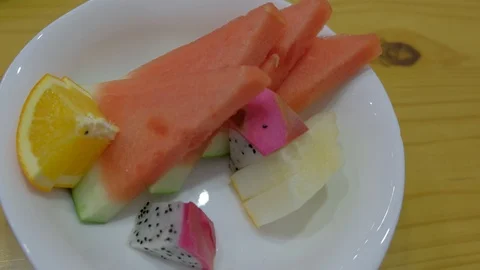 A small plate of fruit made dish Stock Footage 94228049