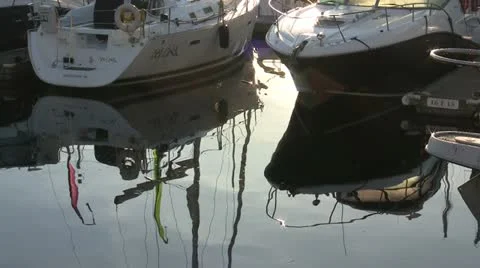Small Pleasure Craft Rippling Reflections Stock Footage 12582690