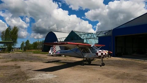 Small pleasure plane on the grounds of the flight school Video stock 194585842
