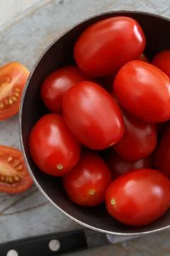 Small plum tomatoes Stock Photos
