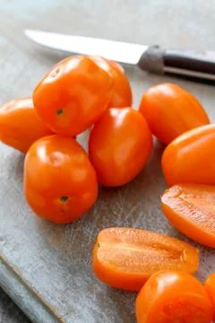 Small plum tomatoes Stock Photos