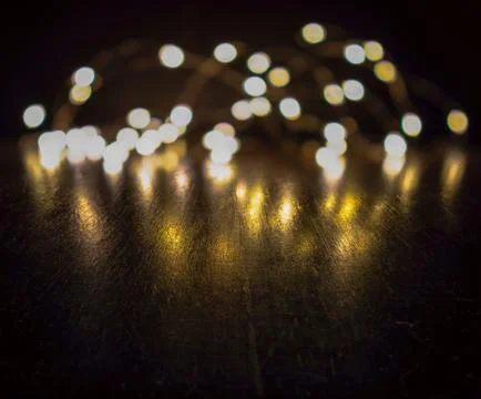 Small points of lights on a black background Stock Photos