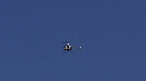 Small police helicopter Stock Footage 24752788