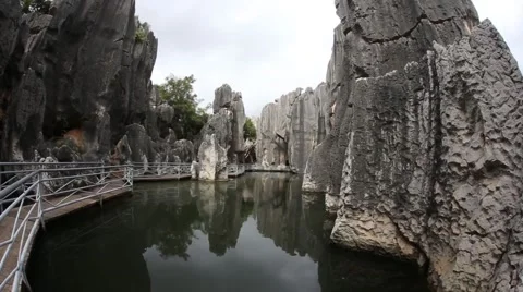 Small pond amid sharp rocks Stock Footage 55712525