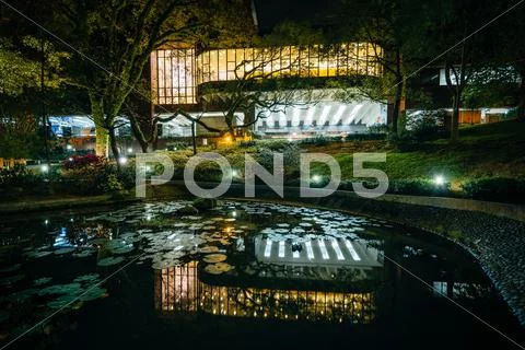 Small pond and modern buildings at night, from Hong Kong University, in Hong Stock Photos